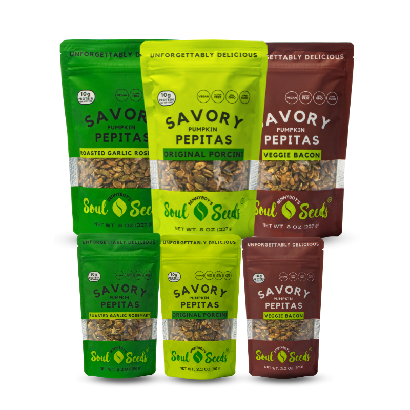 Six packages of Soul Seeds savory pumpkin pepitas on a white background